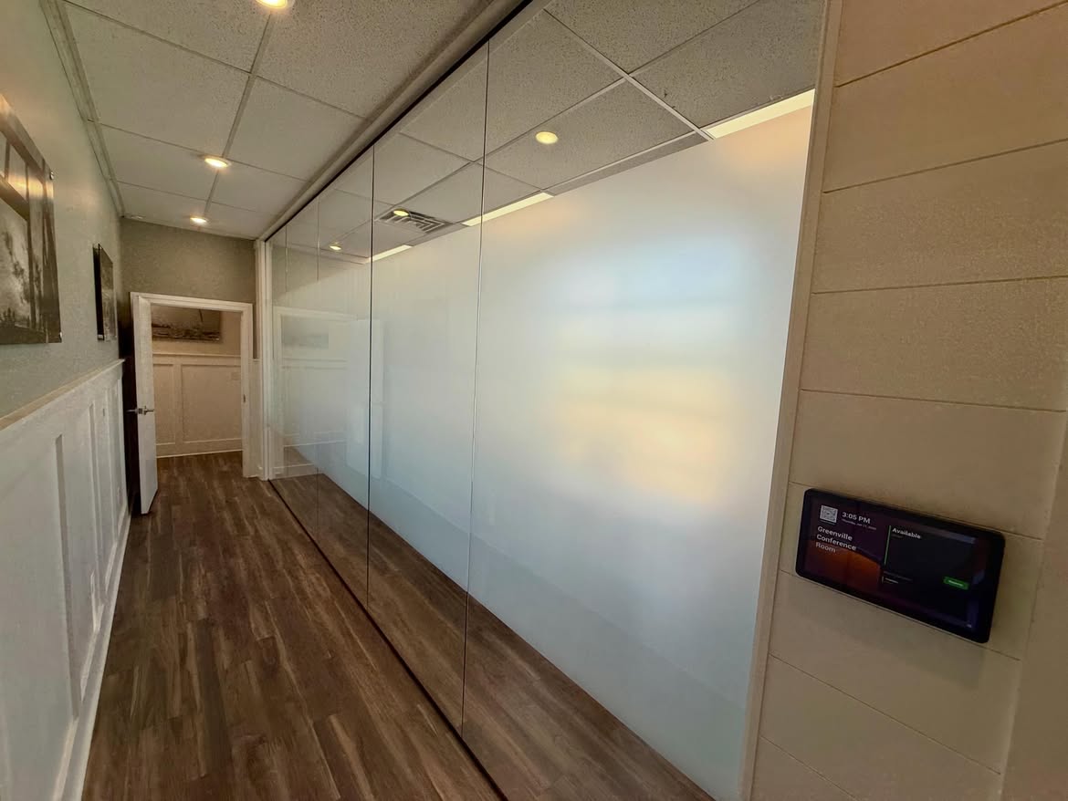 Frosted privacy window film in Mongo Homes Greenville office conference room